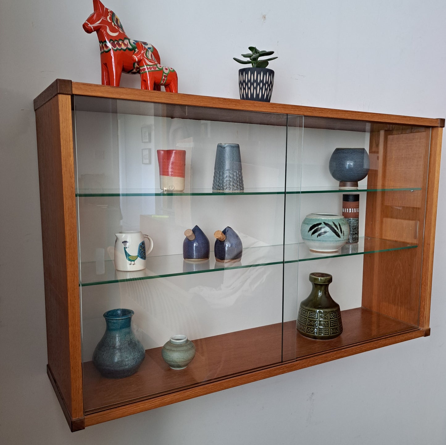 Beaver and Tapley SL Floating Wall System - Glass Front Cabinet with Glass Shelves